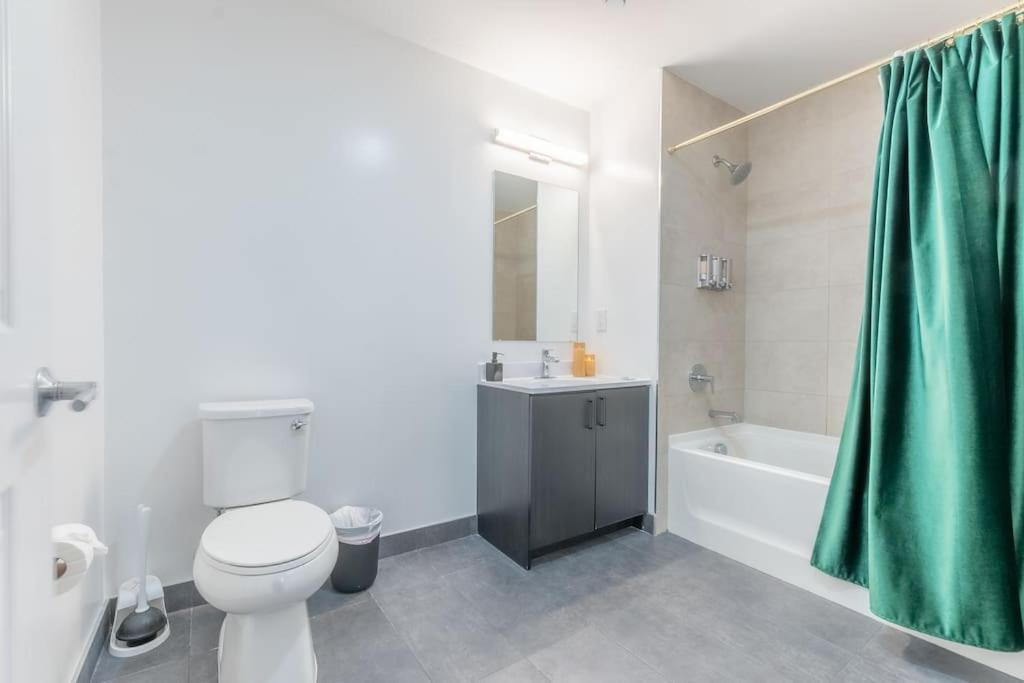Spacious Airport Suite: Two-Bedroom Comfort with Laundry Orange Exterior photo